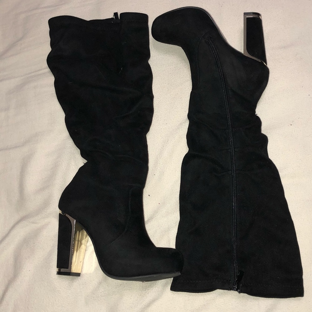 Up to the knee black boots